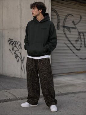 Essentials Pullover Hoodie in Black. NWT.